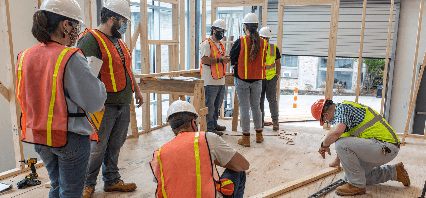 Construction students build model home